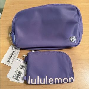 Selling as a bundle Lululemon Dark Lavender 1L belt bag and clippable pouch.